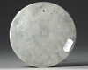A CHINESE CIRCULAR "LIONS AND BIRDS" SILVER MIRROR, TANG DYNASTY (618-907 AD)