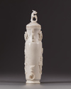 A Chinese ivory ‘chilong’ vase and cover