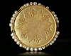 A FATIMID GOLD ROUNDEL WITH PEARL SURROUND, 10TH-11TH CENTURY