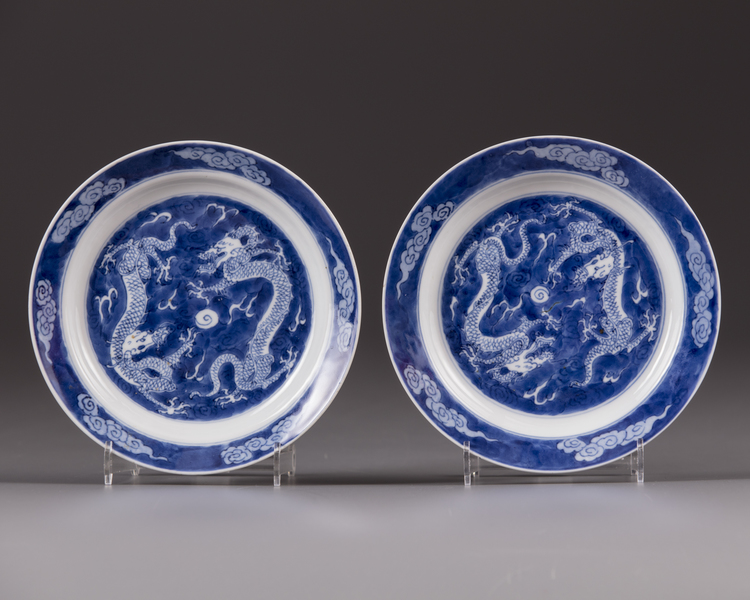 A pair of Chinese blue and white 'dragon' dishes