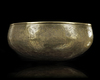 A SILVER INLAID BRASS BOWL, 14TH CENTURY
