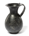 A BUCCHERO NERO OINOCHOE, 6TH CENTURY BC
