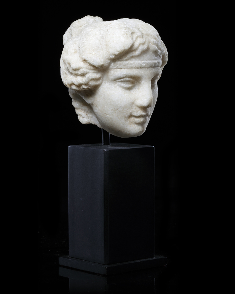 A HEAD OF APOLLO, MARBLE, GREEK, EARLY 4TH CENTURY BC