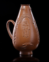 A ROMAN RED WARE PERIFORM VASE, ROMAN, 3RD CENTURY AD