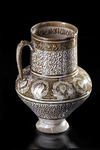 * A KASHAN LUSTRE POTTERY JUG, PERSIA, 13TH CENTURY