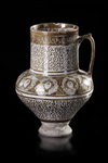 * A KASHAN LUSTRE POTTERY JUG, PERSIA, 13TH CENTURY