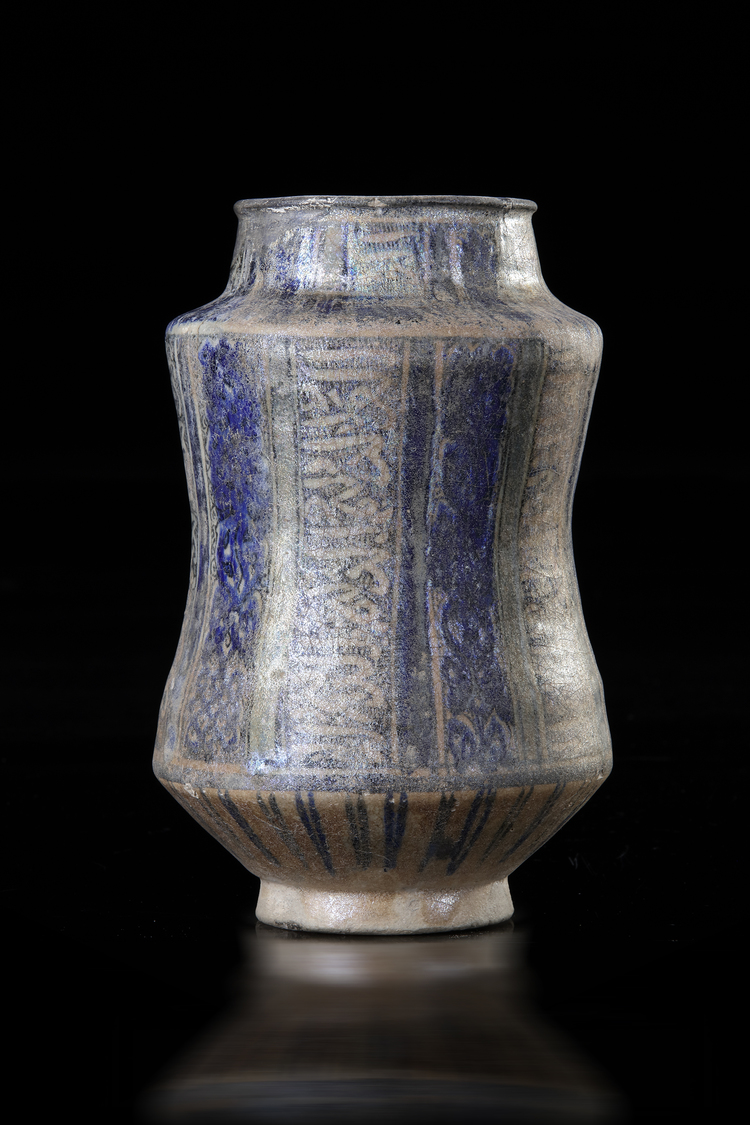 A KASHAN GLAZED POTTERY JUG  (ALBARELLO), PERSIA, 14TH CENTURY