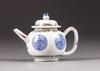 A small famille verte teapot with cover