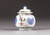 A small famille verte teapot with cover