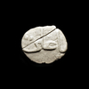 AN EARLY ISLAMIC CLAY AMULET, 10TH-11TH CENTURY