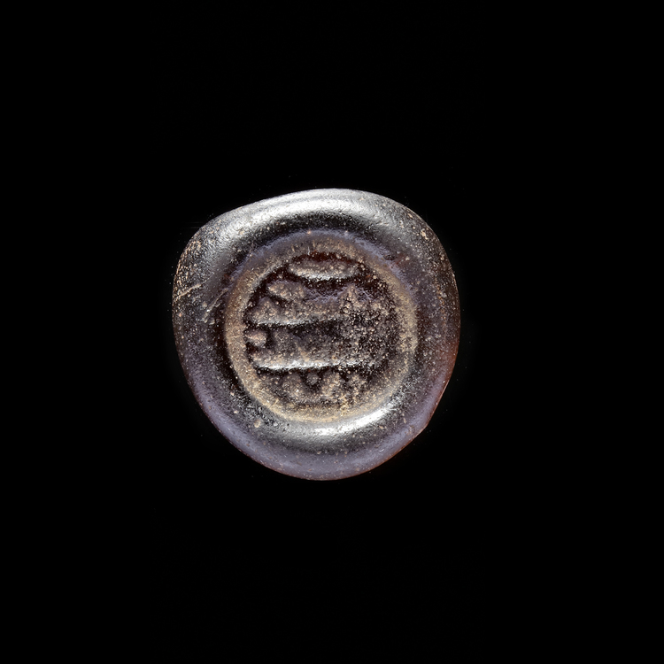 AN EARLY ISLAMIC GLASS WEIGHT OF DIRHAM,10TH-11TH CENTURY
