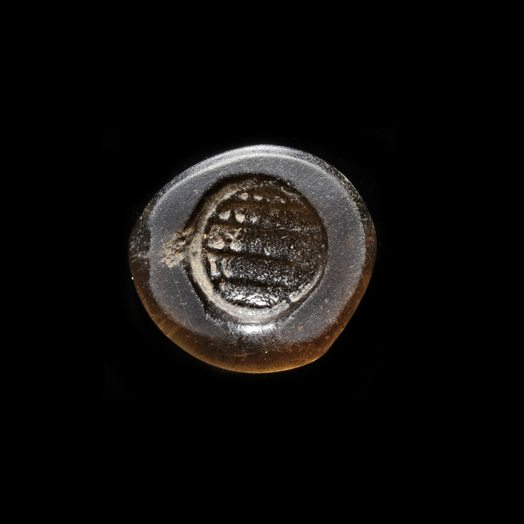 AN EARLY ISLAMIC GLASS WEIGHT OF DOUBLE DIRHAM, 10TH-11TH CENTURY