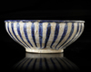 A KASHAN POTTERY BOWL, PERSIA, 13TH CENTURY