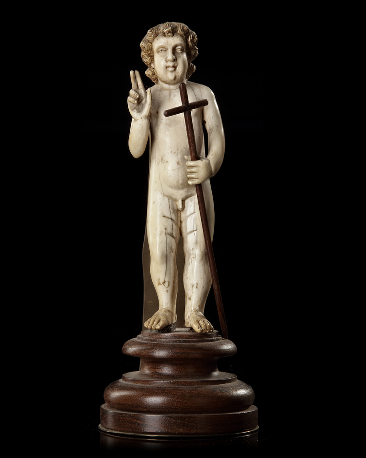 AN INDO-PORTUGUESE FIGURE OF THE INFANT CHRIST AS SALVATOR MUNDI, GOA, 17TH-18TH CENTURY
