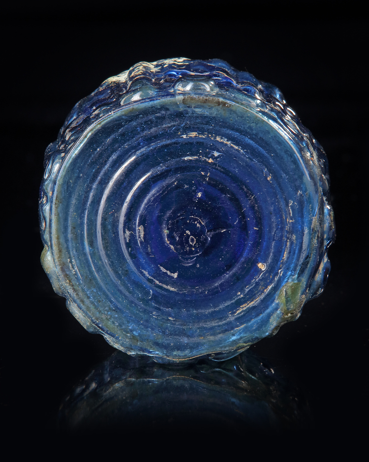 A BLUE GLASS BOTTLE, MESOPOTAMIAN REGION, 10TH CENTURY