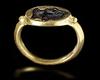 A ROMAN GOLD RING WITH PORTRAIT GARNET INTAGLIO, CIRCA 1ST CENTURY B.C, 1ST CENTURY A.D.