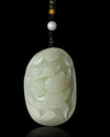 A CHINESE JADE CARVED PENDANT, 20TH CENTURY