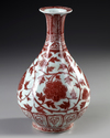 A CHINESE COPPER-RED FLORAL PEAR SHAPED VASE, QING DYNASTY (1644-1911)