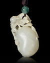 A CHINESE JADE CARVED PENDANT, 20TH CENTURY