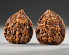 CHINESE CARVED HEDIAU FRUIT NUT BEADS, 19TH CENTURY