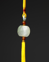 A CHINESE PEKING GLASS OFFICIAL NECKLACE ( CHAOZHU), 19TH-20TH CENTURY