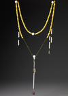 A CHINESE PEKING GLASS OFFICIAL NECKLACE ( CHAOZHU), 19TH-20TH CENTURY