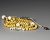 A CHINESE PEKING GLASS OFFICIAL NECKLACE ( CHAOZHU), 19TH-20TH CENTURY