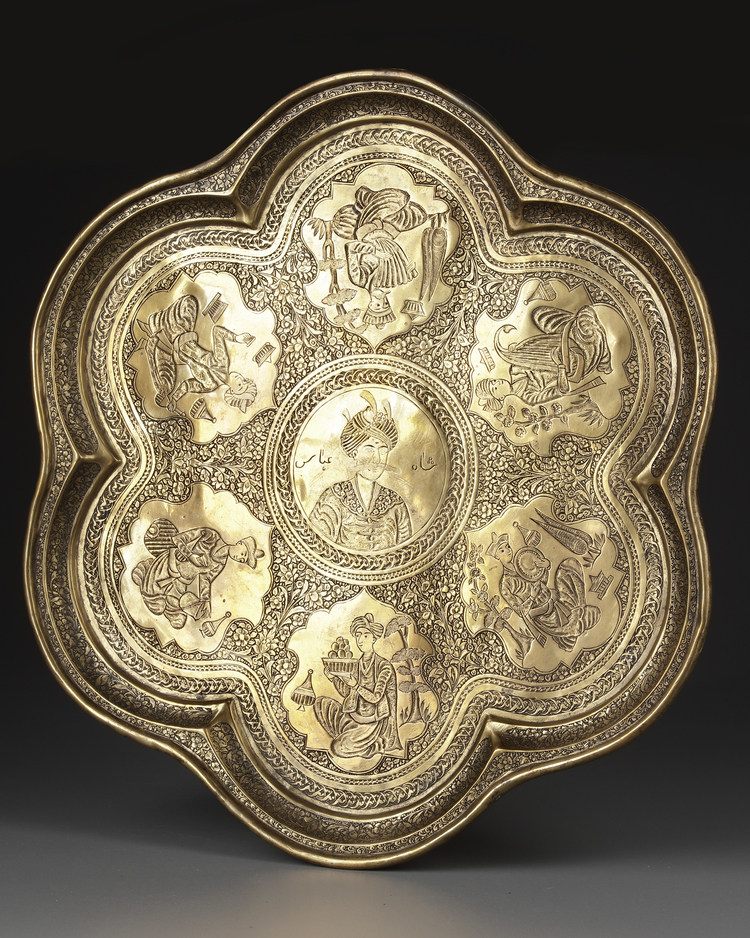A QAJAR ENGRAVED BRASS TRAY DEPICTING SHAH ABBAS THE GREAT, PERSIA, 19TH CENTURY