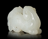 A CHINESE JADE CARVED BUDDHIST LION, 20TH CENTURY