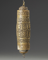 A GILT BRASS SCROLL HOLDER, INDIA 20TH CENTURY