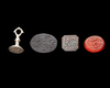 FOUR PERSIAN AGATE AND SILVER SEALS, QAJAR PERIOD, 19TH CENTURY