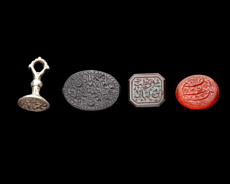 FOUR PERSIAN AGATE AND SILVER SEALS, QAJAR PERIOD, 19TH CENTURY