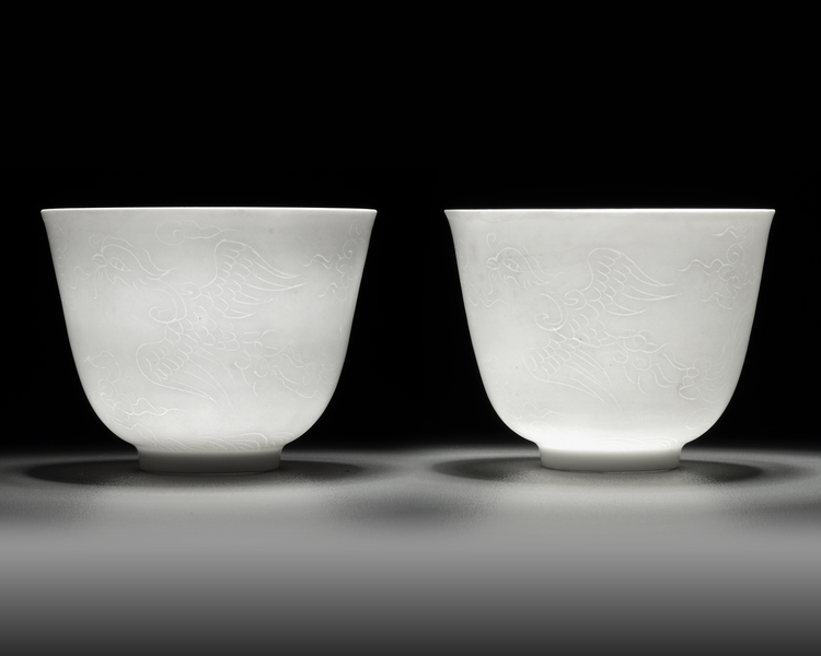 A  PAIR OF SMALL CHINESE WHITE-GLAZED PHOENIX CUPS, 20TH CENTURY