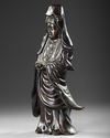 A CHINESE BRONZE FIGURE OF GUANYIN, 20TH CENTURY
