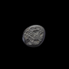 AN EARLY ISLAMIC GLASS WEIGHT OF QUARTER DINAR