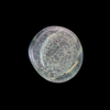 AN EARLY ISLAMIC GLASS WEIGHT OF HALF DINAR