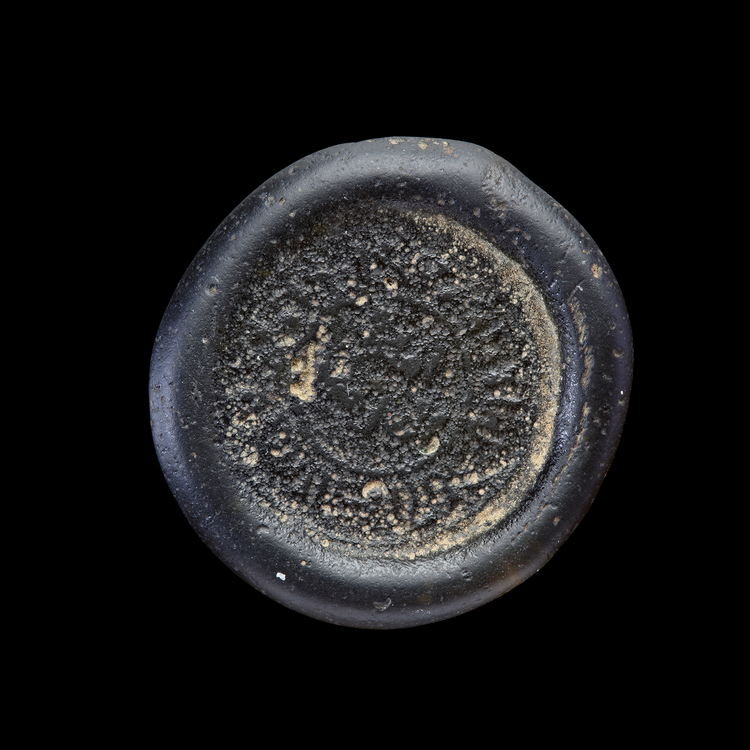 AN EARLY ISLAMIC GLASS WEIGHT OF DOUBLE DIRHAM