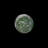AN EARLY ISLAMIC GLASS WEIGHT OF HALF DIRHAM