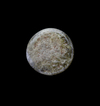 AN EARLY ISLAMIC GLASS WEIGHT OF HALF DIRHAM, 10TH-11TH CENTURY