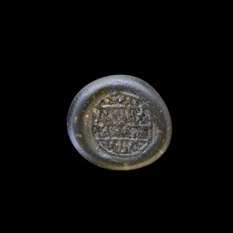 AN EARLY ISLAMIC GLASS WEIGHT OF DIRHAM 10TH-11TH CENTURY