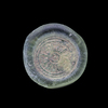 AN EARLY ISLAMIC GLASS WEIGHT OF DOUBLE DIRHAM
