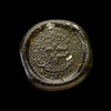 AN EARLY ISLAMIC GLASS WEIGHT OF DINAR, 10TH-11TH CENTURY