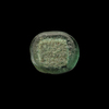 AN EARLY ISLAMIC GLASS WEIGHT OF HALF DIRHAM