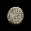 AN EARLY ISLAMIC GLASS WEIGHT OF QUARTER DIRHAM, 10TH-11TH CENTURY
