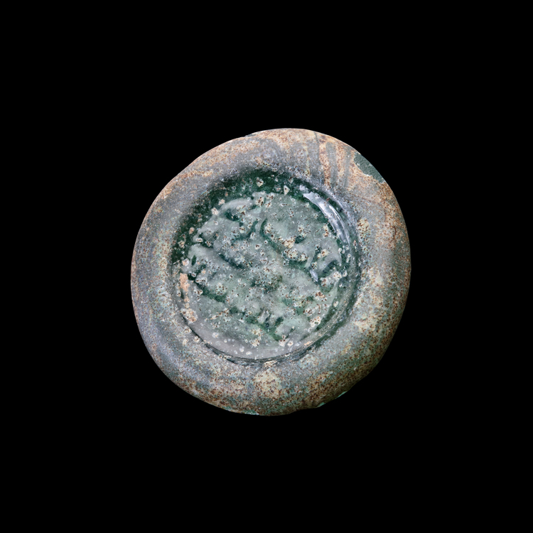 AN EARLY ISLAMIC GLASS WEIGHT OF DIRHAM,10TH-11TH CENTURY