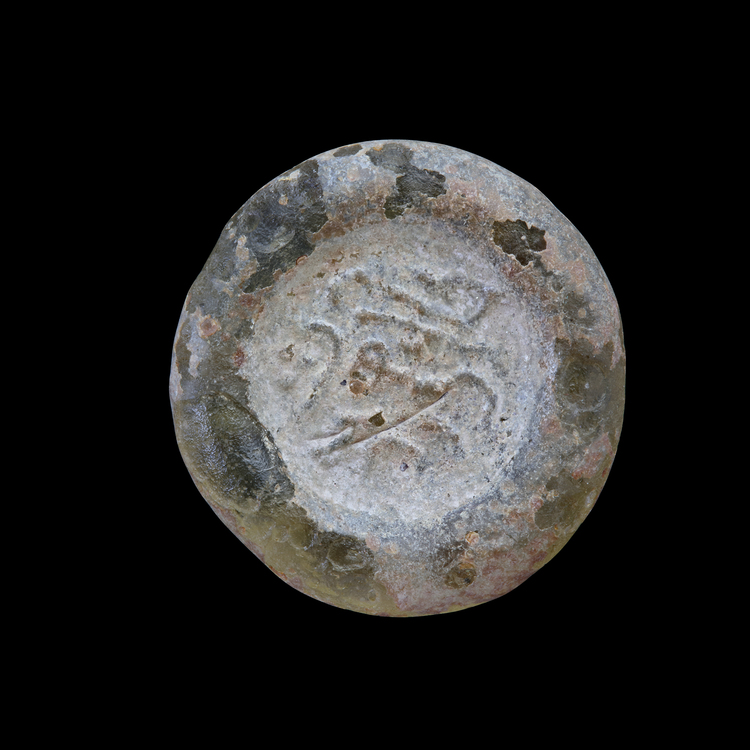 AN EARLY ISLAMIC GLASS WEIGHT OF DOUBLE DIRHAM, 10TH-11TH CENTURY
