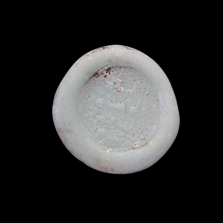 AN ABBASID GLASS WEIGHT OF DOUBLE DIRHAM, BAGHDAD AL-NASIR LI-DIN ALLAH, 576-622 AH/1180-1225 AD
