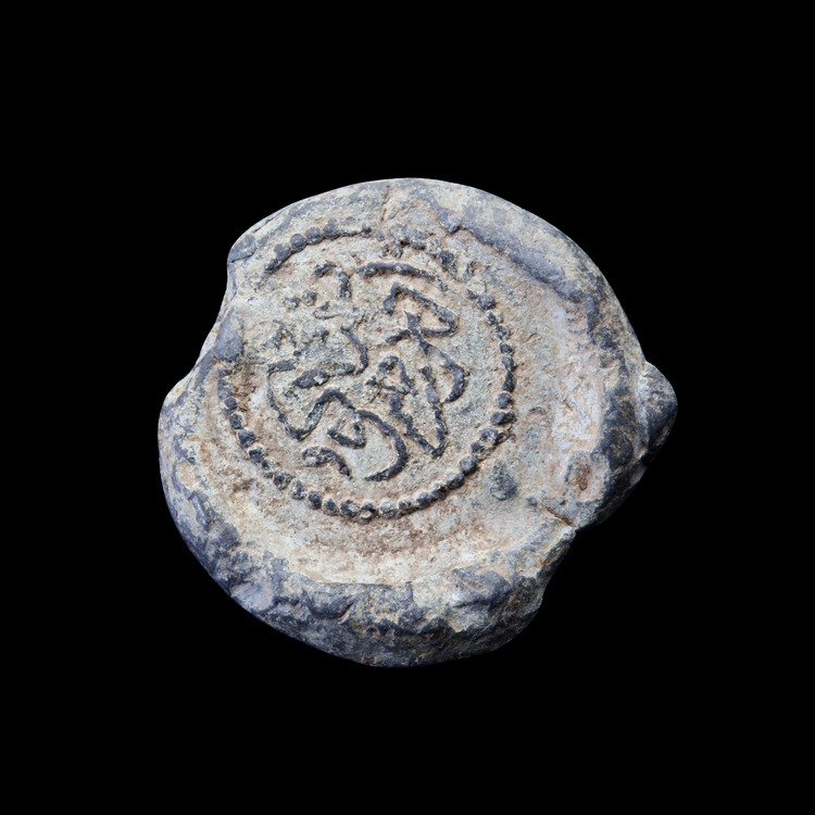 AN EARLY ISLAMIC VESSEL STAMP, 14TH-15TH CENTURY