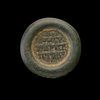 AN EARLY ISLAMIC GLASS WEIGHT OF DOUBLE DIRHAM