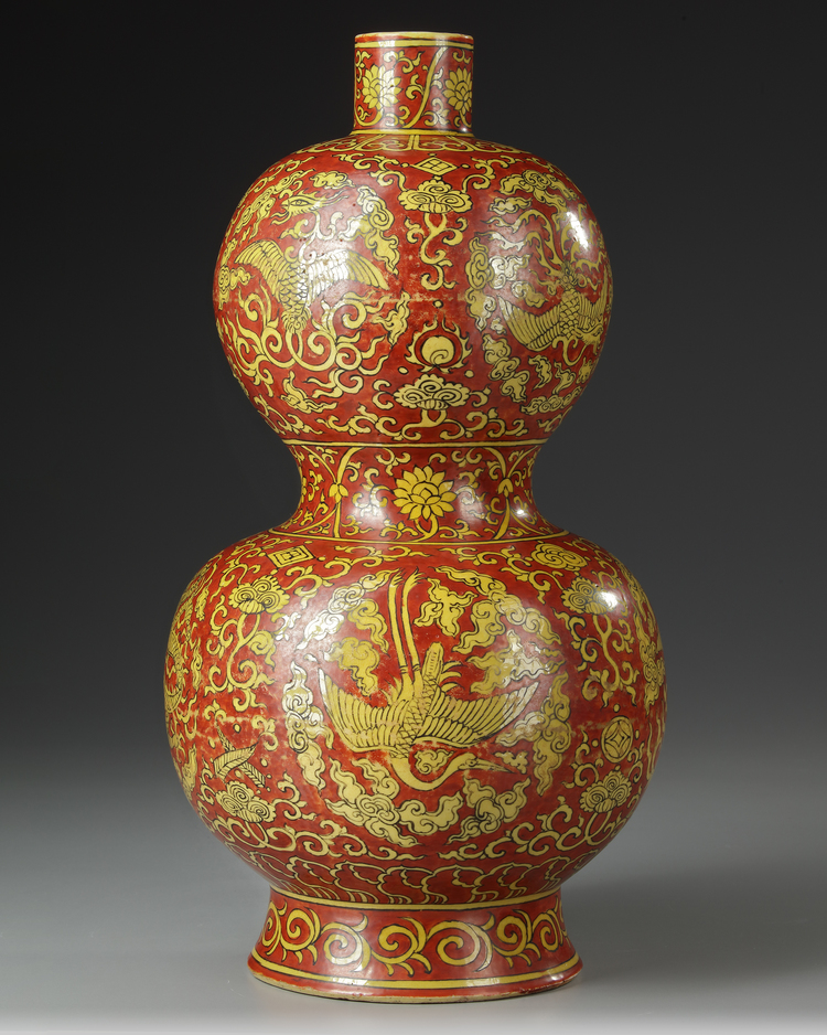 A LARGE YELLOW AND RED-ENAMELED 'DRAGON AND PHOENIX' DOUBLE-GOURD VASE, MING DYNASTY (1368-1644) OR LATER